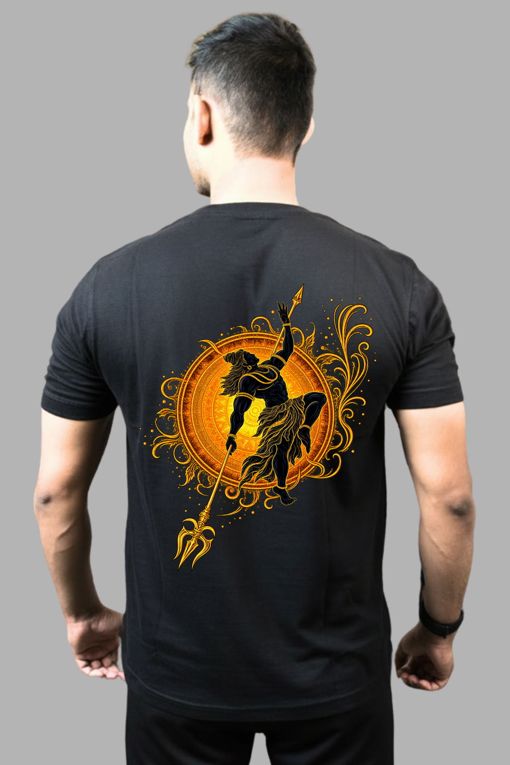 Man wearing a black regular-fit T-shirt with a golden Mahadev and trishul back print