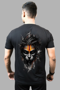 Man wearing a black regular-fit T-shirt with a monochrome Hanuman face and glowing saffron tilak printed on the back