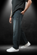 Men's Straight Fit Jeans Washed Black - Side view on model showing straight leg