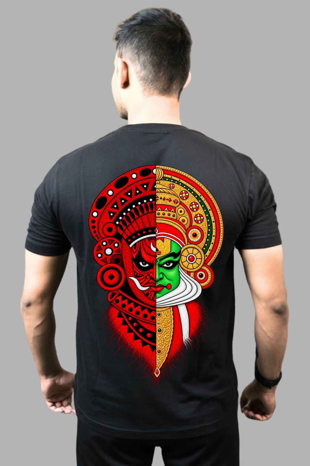 Man wearing a black regular-fit T-shirt with a colourful split Theyyam and Kathakali face print on the back
